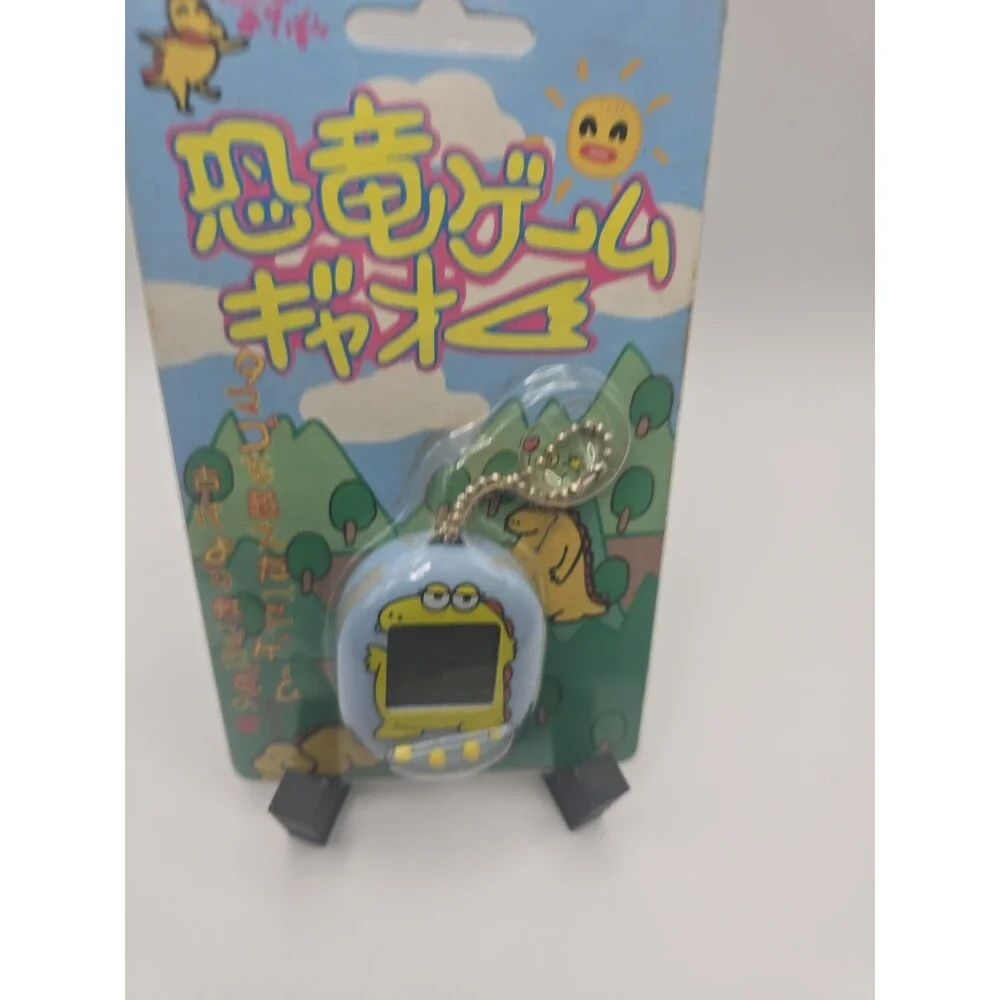 Retro Dinosaur game Gao! Tamagotchi style virtual pet - Sealed - CIB 1996/1997